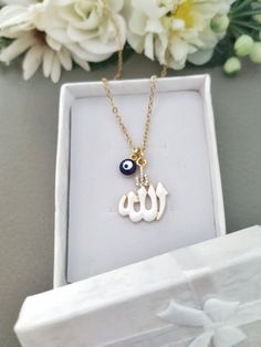 Note! Current delivery time is about 2-4 weeks Girls Allah Necklace, 14k Gold plated Kids Allah Pendant Necklace, Allah Name Personalized Necklace, Islamic Muslim Eid Gift Handcrafted necklace featuring rhinestones enamel Allahu pendant with evil eye and initial letter. Custom made size for adults or kids Makes a beautiful and thoughtful gift for your loved ones. White Charm Necklace With Adjustable Chain As Gift, White Charm Necklace For Gifts, White Pendant Charm Necklace As Gift, White Pendant Charm Necklace For Gifts, White Enamel Pendant Charm Necklaces, White Enamel Necklaces For Gifts, Allah Necklace, Allah Name, Allah Pendant