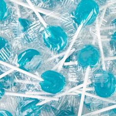 blue candy lollipops in plastic wrappers