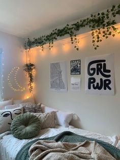 a bedroom with plants hanging on the wall