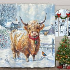 a shower curtain with a painting of a cow in the snow next to a christmas tree