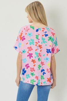 Floral print v-neck short sleeve top featuring drop shoulders. Unlined. Woven. Non-sheer. Lightweight. Fabric Content 100%POLYESTER Model 5'9" and wearing size Small. Short Sleeve Top, Lightweight Fabric, Baby Pink, Drop Shoulder, Short Sleeves Tops, Sleeve Top, Floral Print, Floral Prints, V Neck