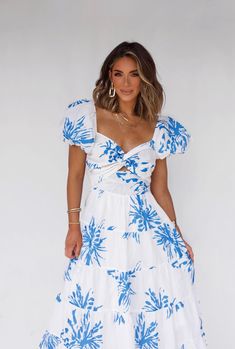 Live the island life in our Island Status Maxi Dress. With a white base adorned by tropical leaves, this dress is perfect for any vacation. Embrace the beachy vibes and feel your best in this flowy and stylish piece. It's a must-have for your next tropical getaway! Fabric 98% polyester, 2% spandex Lining 100% polyester Breezy Short Sleeve Vacation Dress, Tropical Midi Dress For Beach Season Brunch, Tropical Midi Dress For Brunch During Beach Season, Beachy Floral Print Short Sleeve Dress, Beachy Short Sleeve Floral Dress, Vacation Brunch Dresses With Short Sleeves, Vacation Dresses For Brunch With Short Sleeves, Short Sleeve Dresses For Brunch Vacation, Tropical Midi Dress For Beach Day Out