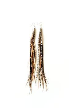 PRICES MAY VARY. Luxurious long natural rooster feathers in color (Natural) Average length 7 -10 inches long from hook to tip (Length will vary slightly from pair to pair.) .925 sterling silver hypo allergenic earring hooks Ultra lightweight at only about 0.5 grams each (less than a US dime) Makes an excellent gift for any occasion! Handmade just for you Make a statement with these simple unique handmade striking long thin rooster feather earrings. They are 7"- 10" long, lightweight and look gre Long Feather Earrings, Bold Bohemian, Rooster Feathers, Bohemian Handmade, Feather Jewelry, Earring Hooks, Feather Earrings, Down Hairstyles, Up Hairstyles