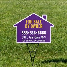 a for sale by owner sign in the grass