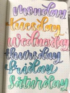 someone holding a notebook with some writing on it and the words monday written in different colors