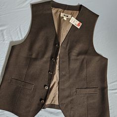 New With Tags Brown Vest Casual Business Vest With Pockets, Casual Winter Vest For Business Casual, Winter Business Casual Vest, Casual Business Winter Vest, Business Vest With Welt Pockets For Fall, Casual Single-breasted Business Vest, Casual Business Vest With Button Closure, Business Vest With Pockets For Fall, Winter Business Casual Vest With Pockets