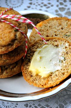 some cookies and butter on a white plate