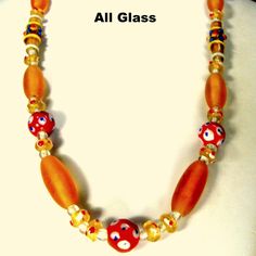 "Red Peach Clear Polka Dot Glass Bead Necklace, OOAK by Rachelle Starr Yes i love handmade glass beads... from anywhere... necklace is 27\" ( 68.58cm ) all glass peach tubes are 1\" long 26mm round red dot beads are 1/2\" or 13mm Note to Customers: I ONLY ship to Your paid ETSY invoice ADDRESS I DO SHIP Internationally I combine shipping of multiple items and Immediately refund the difference ( alot!). www.vintagestarrbeads.etsy.com ©2019 rachelle starr designs all rights reserved" Red Glass Necklace With Spacer Beads, Handmade Orange Glass Necklaces, Handmade Orange Glass Necklace, Orange Glass Beaded Necklace With Colorful Beads, Orange Glass Necklace With Colorful Beads, Orange Glass Beaded Necklaces, Orange Glass Beaded Necklace For Gift, Red Peach, Handmade Glass Beads