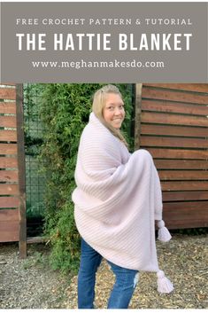 a woman wearing a pink knitted shawl with text overlay that reads free crochet pattern & video the hattie blanket