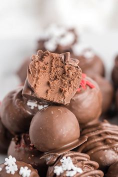 chocolates stacked on top of each other with white sprinkles