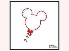 a mickey mouse head with a red bow on it's tail and scissors in the shape of a heart