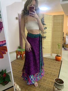 This unique wrap skirt is a one of a kind in the hole world ✨ The fabric goes on it's one unique story as it is a  one of a kind recycled vintage silk hand picked from unique places and villages 🌱 The fabric also  is so soft and silky and has so many small details that make just that much more Beautiful  ⚛️ It's a 2 in 1 skirt ! As you can where it in its 2 defrent sides✨ Skirt is great for every day, And also luxurious and Stunning for evening where. 🌞 Fabric is is the best thing about it, An Long Bohemian Skirt For Festivals, Bohemian Multicolor Wrap Sarong, Multicolor Bohemian Wrap Sarong, Bohemian Summer Festival Wrap Skirt, Bohemian Multicolor Sarong For Festivals, Multicolor Bohemian Sarong For Festivals, Bohemian Lined Skirt For Festival, Bohemian Harem Skirt For Festivals, Flowy Lined Wrap Skirt