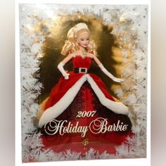 a barbie doll in a red and white dress with snow flakes around it's edges