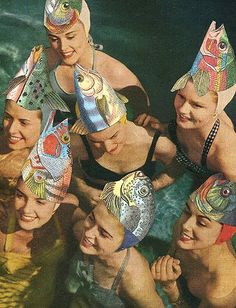 a group of people wearing hats in the water