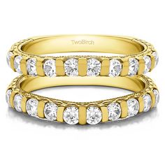 two yellow gold wedding bands with white diamonds