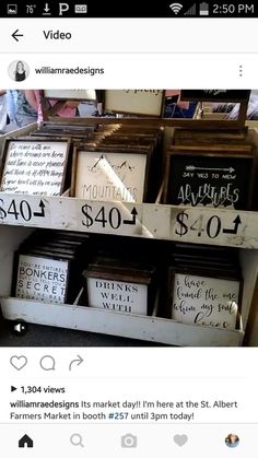 an image of a store display with signs on the shelf and other items for sale