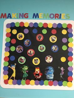 the making memories board is decorated with colorful circles and monsters on it's sides