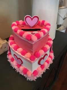 two heart shaped cakes are stacked on top of each other