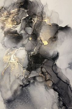 an abstract painting with black and gold paint on it's surface, in the middle of