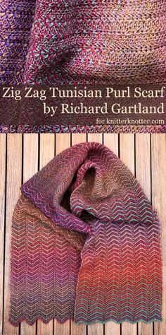 a knitted scarf sitting on top of a wooden floor