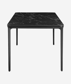 a black table with a marble top and metal legs on an isolated white background, viewed from the front