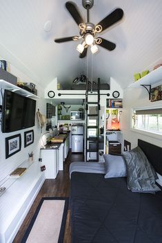 the interior of a tiny home with ceiling fans