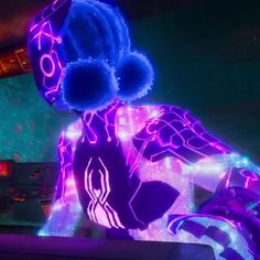 the animated character is dressed in purple and blue lights