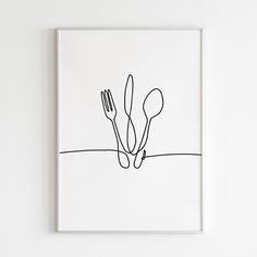 a black and white drawing of utensils stuck in the middle of a table