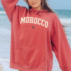 Morocco Sweatshirt, Comfort Colors® Brand Hooded Sweatshirt, Moroccan Shirt Crewneck, Morocco Pullover - Plus Size Too Perfect Holiday, Thanksgiving, Christmas or Birthday gift for your special someone - especially you! This stylish, unisex, garment-dyed hoodie, is made with 80% ring-spun cotton and 20% polyester. Each Comfort Colors® hoodie sweatshirt features garment-dyed, ring-spun fleece with a 100% cotton face, while the hood is jersey-lined with a color-matched flat cord. It also has a rolled-forward shoulder and a back neck patch. * Luxurious Feel - the fabric is soft and pleasant to touch, and has a subtle luxurious feel. Made from specially spun fibers that make very strong and smooth fabric. * Hooded - with drawstrings, and the hood is lined with jersey fabric with a flat cord ti Shirt Detail, Thanksgiving Christmas, Jersey Fabric, Hoodie Sweatshirt, Hooded Sweatshirt, Comfort Colors, Color Matching, Morocco, Sweat Shirt