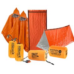 an orange tarp with two lights and three bags next to it on a white background