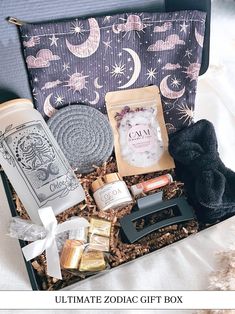 the ultimate zodiac gift box is packed with various items to give as gifts for her