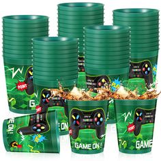 a bunch of cups that have some video game controllers on them in front of each other