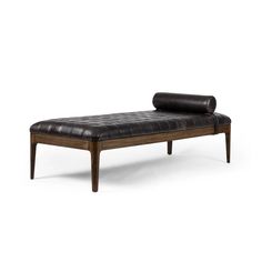 a black leather chaise lounger with wooden legs and arms, on an isolated white background