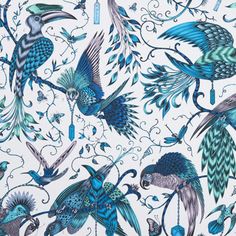 a blue and white wallpaper with birds on it