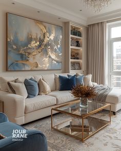 a living room filled with furniture and a large painting on the wall above it's glass coffee table