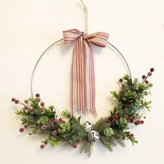 a christmas wreath hanging on the wall