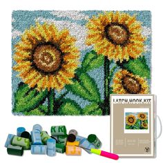 the latch hook kit includes sunflowers and crayons to make it look like they are painted