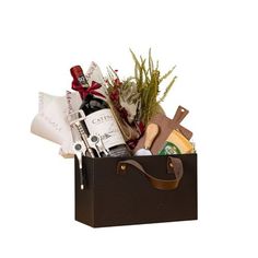 a brown box filled with lots of different types of wine and other things in it