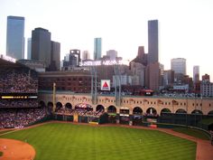 a baseball stadium filled with lots of people