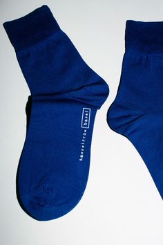 So soft and light you won't know they are on. Wide cuff just above the ankle. Available in a variety of colors. Fabric is a mercerized cotton. Cotton Socks With Ribbed Cuffs, Comfortable Cotton Socks With Ribbed Cuffs, Casual Navy Cotton Socks, Blue Cotton Socks For Summer, Solid Stretch Cotton Socks, Stretch Solid Color Cotton Socks, Casual Fitted Socks With Ribbed Cuffs, Winter Cotton Socks With Ribbed Cuffs, Comfortable Solid Cotton Socks