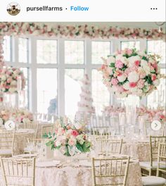 an image of a table set up for a wedding reception with flowers and candles on it