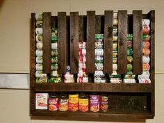 a wooden pallet filled with canned food