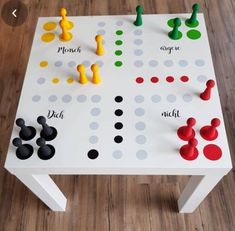 a table with several different colored pieces on it