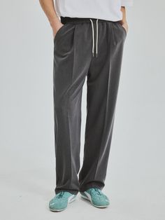 This is a comfortable pants that is made out of high quality polyester, rayon, and spandex blend fabric. With minimal design detail of semi wide silhouette, elastic waistband, and tentar and tumble wahsed fabric, it gives a comfortable and trendy mood. - Semi wide silhouette- Elastic waistband with string- Tentar and tumble washed fabric Versatile Relaxed Fit Dress Pants With Elastic Waistband, Casual Straight Leg Dress Pants With Pull-on Style, Casual Pull-on Straight Leg Dress Pants, Casual Tapered Leg Pull-on Dress Pants, Casual Wide-leg Dress Pants With Elastic Waistband, Comfort Stretch Trousers With Elastic Waistband, Casual Stretch Dress Pants With Elastic Waistband, Relaxed Fit Wide-leg Dress Pants With Elastic Waistband, Casual Wide Leg Pants With Comfort Stretch