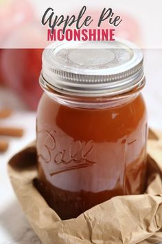 a jar filled with liquid sitting on top of a table