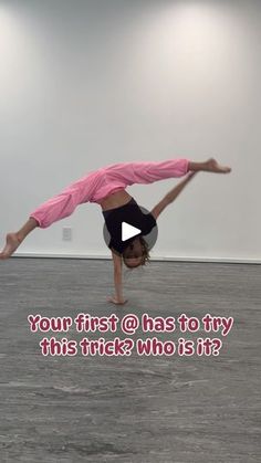 a person doing a handstand in an empty room with the words your first @ has to try this trick who is it?