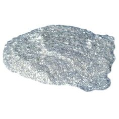 a pile of silver glitter on a white background