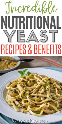 a white plate topped with pasta covered in pesto sauce and garnished with parsley