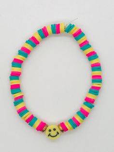 a bracelet with a smiley face on it