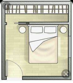 an overhead view of a bedroom with white bedding